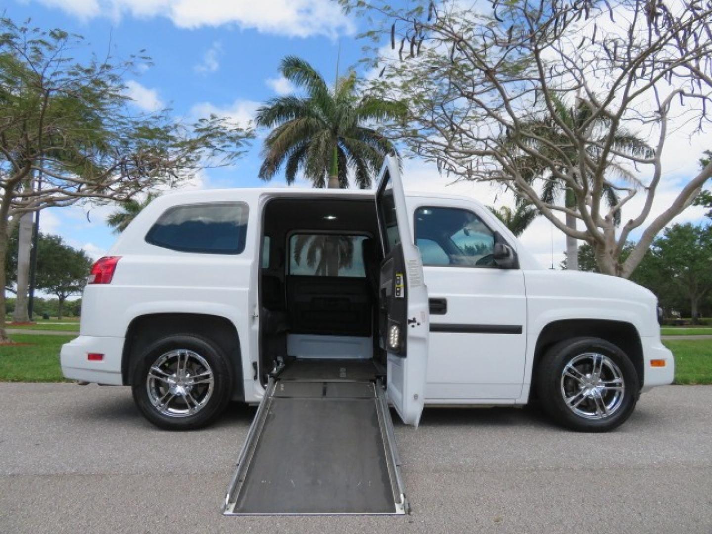 2012 White /Black with an 4.6L V8 engine, Automatic transmission, located at 4301 Oak Circle #19, Boca Raton, FL, 33431, (954) 561-2499, 26.388861, -80.084038 - You are looking at a Gorgeous 2012 Mobility Ventures MV1 Handicap Wheelchair Conversion Van with 64K Original Miles, 4.6L Ford V8, Bleack Leather Type Interior, Alloy Wheels, Power Side Entry Wheelchair Lift with Long Ramp and Short Ramp Function, Q Lock 150 EZ Lock, L-Track Tie Down System, Back Up - Photo#1